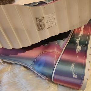 Brand new never worn. Platform boots. Size 9